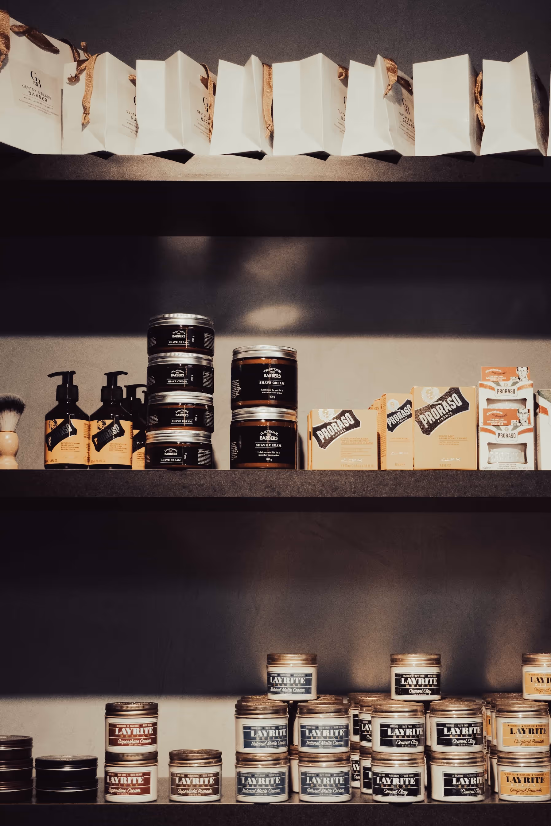 Shelf with multiple high-quality products available at Gentry and Blade.
